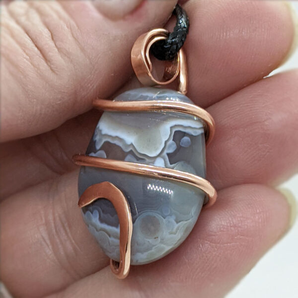 Copper Wire-Wrapped Tumbled Crazy Lace Agate Pendant
