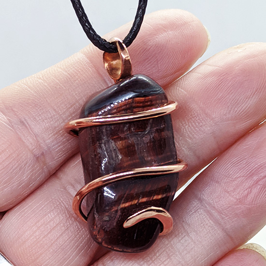 Copper Wire-Wrapped Tumbled Red Tiger Eye Pendant