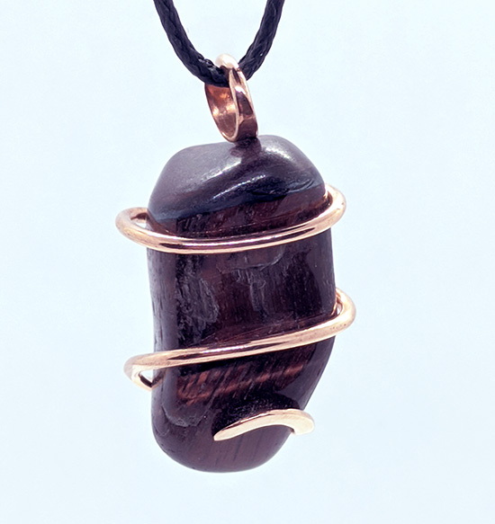 Copper Wire-Wrapped Tumbled Red Tiger Eye Pendant