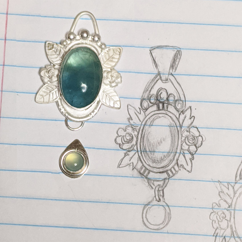 Floral pendant work in progress next to sketch